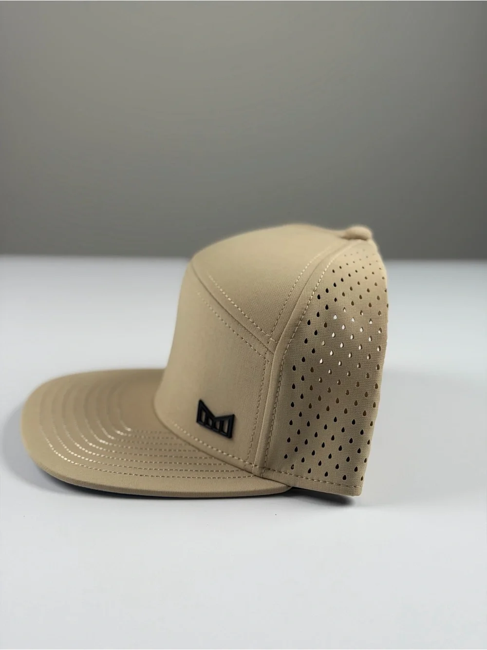 Melin Trenches Icon Hydro Performance Snapback Hat in Khaki, Classic